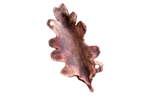 the backside of a sculpted oak leaf