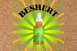 A tincture bottle featuring decorative kissing snails emanates gold and green rays with the text BESHERT on a golden glittery background