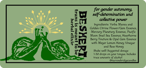 A tincture label featuring descriptive text and an image of two snails kissing beneath a golden crown