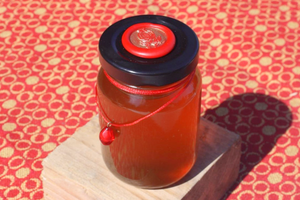 a glowing jar of honey in the sun
